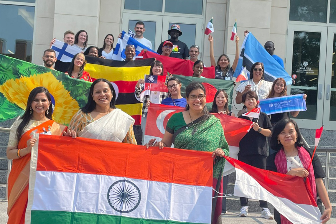 Group photo of 2024 Fulbright teachers on the front steps of LeChase Hall