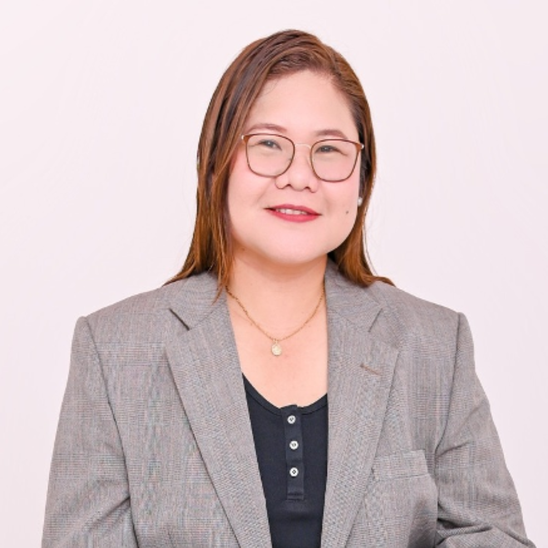 Kristine Joan Barredo posing for her portrait, smiling at the camera.