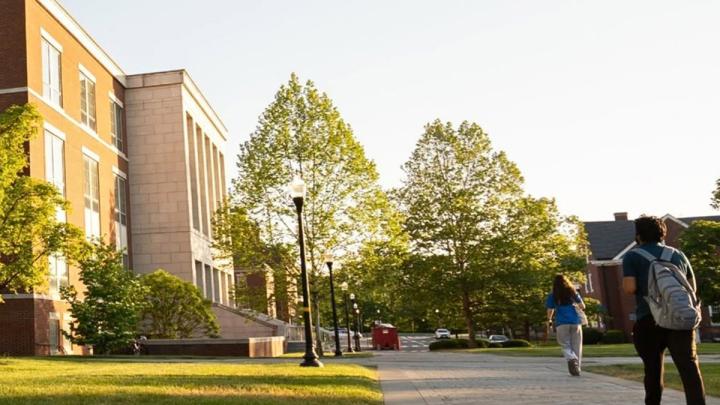 Students walking toward LeChase Hall.