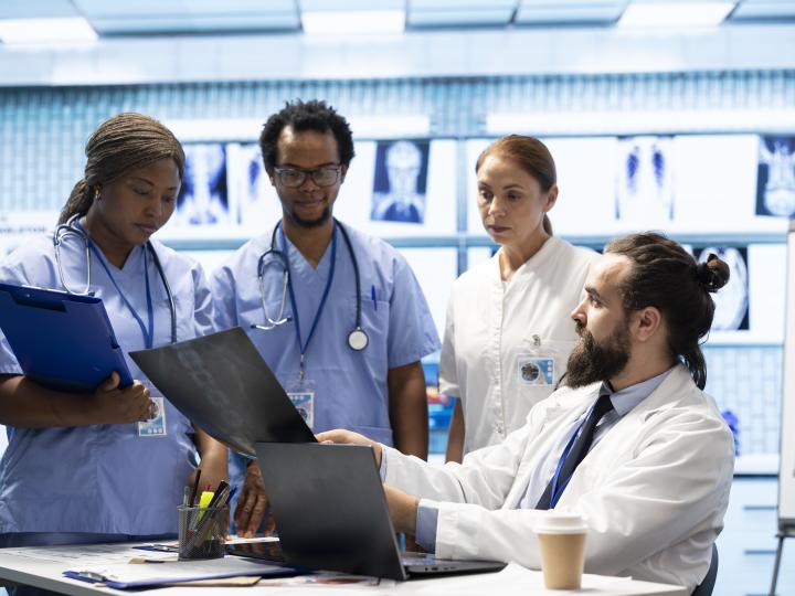 Medical doctors interacting in a clinical setting